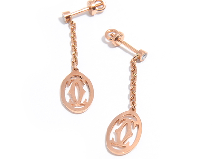 Сережки у стилі CARTIER