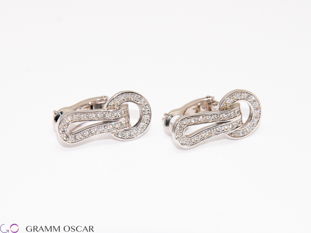 Сережки у стилі CARTIER