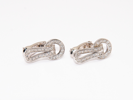 Сережки у стилі CARTIER