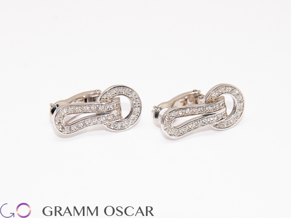 Сережки у стилі CARTIER