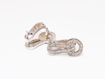 Сережки у стилі CARTIER