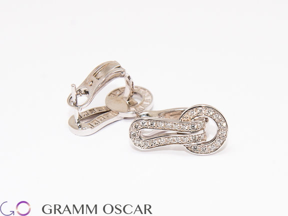 Сережки у стилі CARTIER