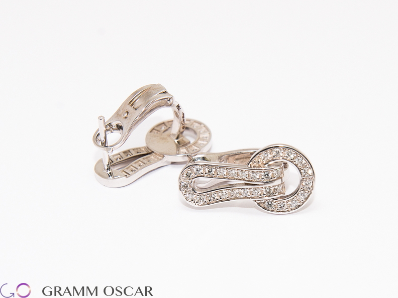 Сережки у стилі CARTIER