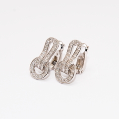 Сережки у стилі CARTIER
