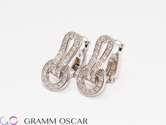 Сережки у стилі CARTIER